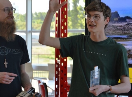 student explaining hackathon